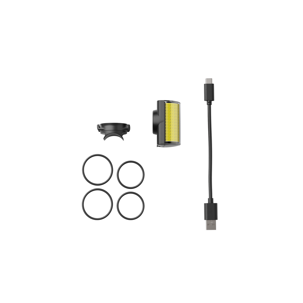 Contenu du pack : lumière avant LED Shapeheart, fixation élastique robuste et câble de recharge inclus.